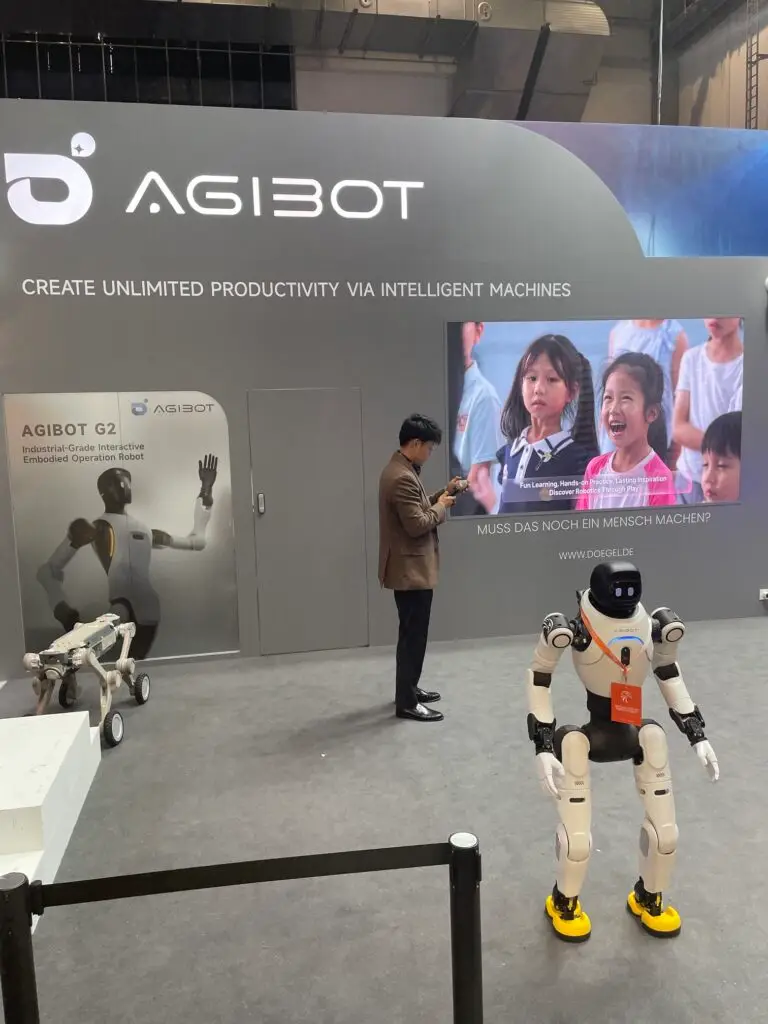 Agibot booth at IFA Berlin 2026 with a humanoid robot on display and visitors viewing the exhibit.